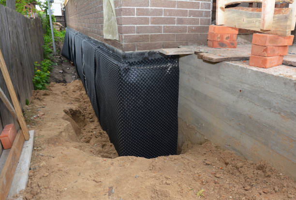 Happy homeowners after waterproofing job in Oregon City